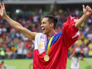 Carlos Yulo celebrates winning Olympic gold medal.