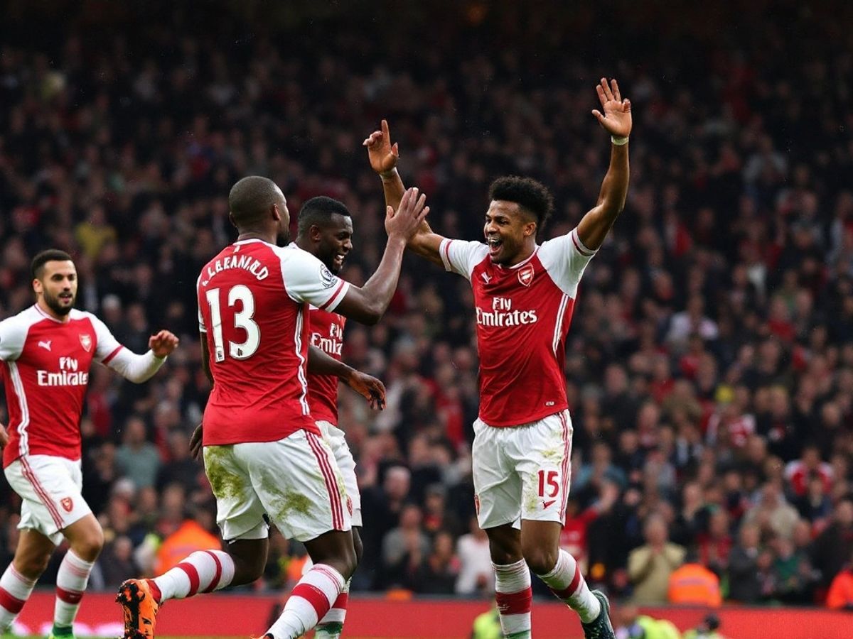 Arsenal Players Celebrating During A Match Against Liverpool.