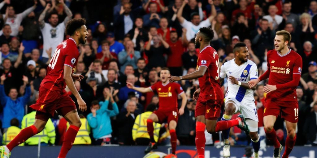 Liverpool Players Celebrate A Goal Against Brighton In League Cup.