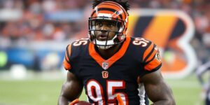 Isaiah Williams In Bengals Uniform Holding A Football.